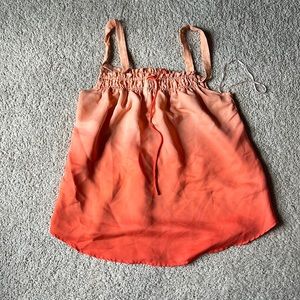 Sleeveless top.   Adjustable